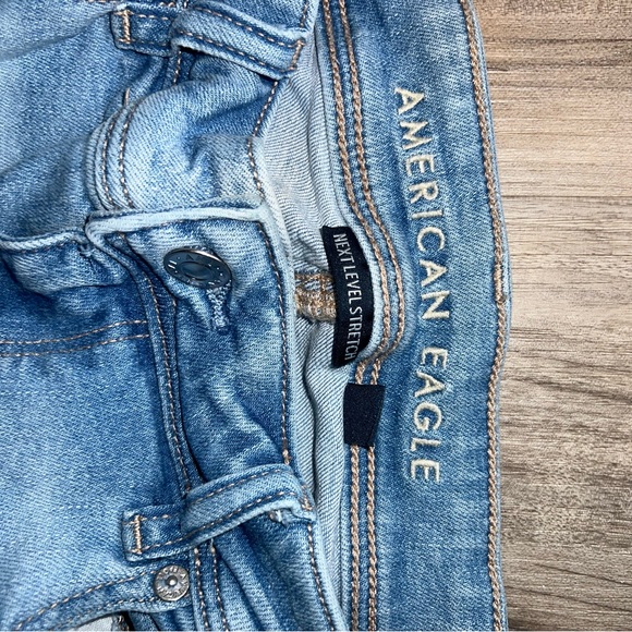 AE Stretch Low-Rise Kick Bootcut Jean - Picture 5 of 9